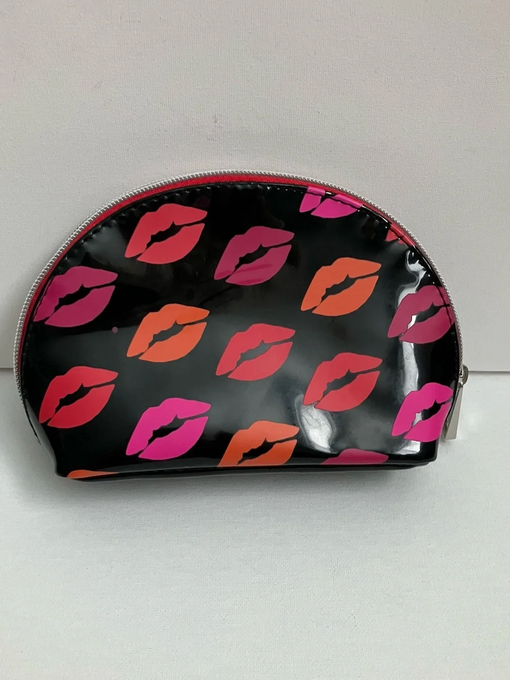 Buxom Black Cosmetic Pouch with Pink & Orange Kiss Print